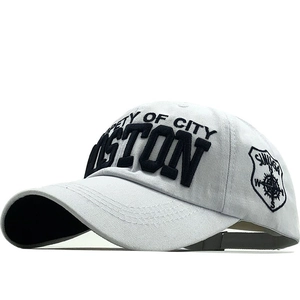 Light gray cotton baseball cap with blue Boston embroidery and side shield patch detail