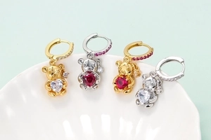 Cute bear earrings with heart-shaped zircon stones in gold and silver finishes