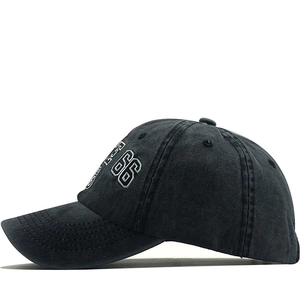 Detail of Route 66 embroidery on dark grey distressed washed cotton baseball cap