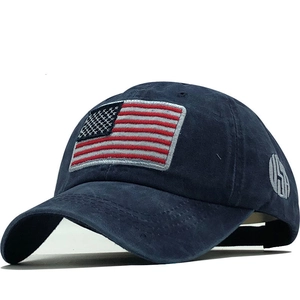 Navy blue washed cotton baseball cap with embroidered USA flag and side lettering