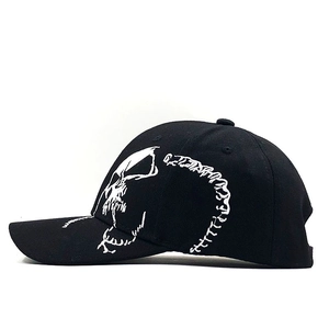 Fashionable black baseball cap with bold white skull graffiti embroidery for men and women