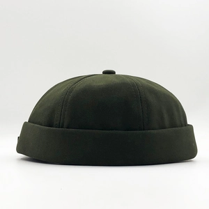 Retro olive green canvas docker cap with high-quality stitching and rolled edge design