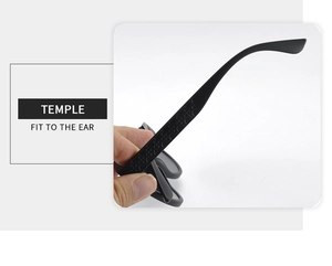 Detailed macro view of black matte sunglasses temples with embossed designer pattern