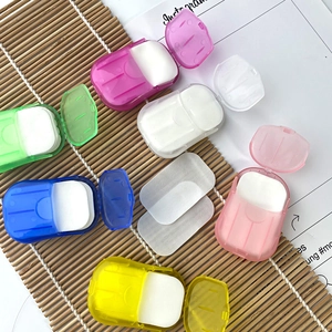 Detailed view of portable paper soap sheets in colorful cases for outdoor hand washing