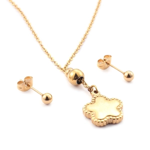 Elegant gold stainless steel jewelry set featuring a floral clover pendant and ball earrings
