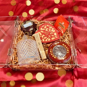 Luxury gift box with heart chocolate, tea, lipstick, candle, and relief glass jar