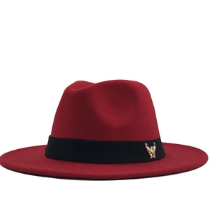 Classic burgundy wool fedora hat with a black ribbon and gold eagle badge detail