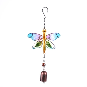 Detail of dragonfly metal wind chime with colorful gradient wings and bronze bell