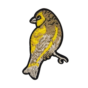 Detailed yellow and brown bird embroidery patch with black stitched edges for DIY clothing