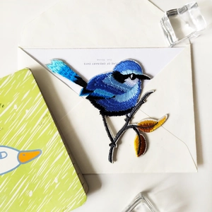 Blue bird embroidery patch on branch, high-quality handmade sewing accessory for DIY decor