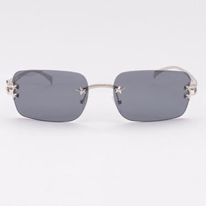 Lunettes de soleil sans monture avec étoiles en métal et verres fumés style hip-hop