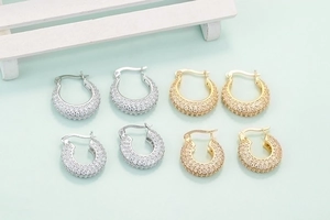 Sparkling pave zircon hoops in gold and silver finish, elegant round quilted patterns