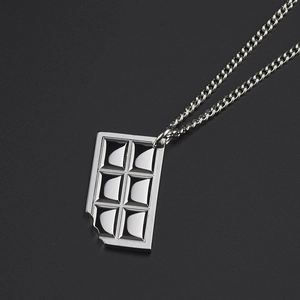 Polished silver stainless steel necklace with bite-mark chocolate bar pendant