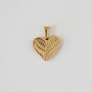 Detailed view of heart-shaped gold-plated pendant with intricate angel wing texture