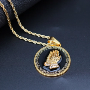 Golden hiphop prayer hands pendant necklace with Greek key pattern border and twist chain