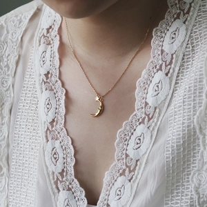 18K gold plated titanium steel necklace featuring a crescent moon and star pendant