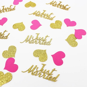 Golden glitter Just Married text and rose pink hearts confetti for wedding party decor