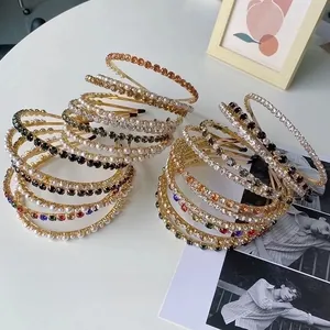 Detailed view of various baroque alloy headbands with pearls and rhinestones