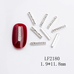 Detailed view of silver metal nail art strips with 10 clear rhinestones, size 1.9x11.8mm