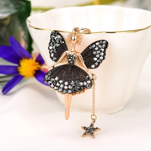 Golden angel fairy keychain with black crystal inlay and star pendant on a chain