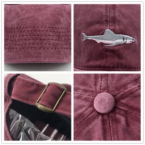 Vintage burgundy washed cotton baseball cap featuring shark embroidery and metal buckle