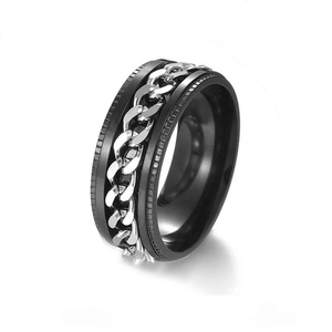Detailed view of black and silver spinning chain ring for stress relief and anxiety