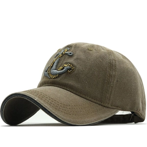 Vintage washed army green denim baseball cap with anchor embroidery in side view profile