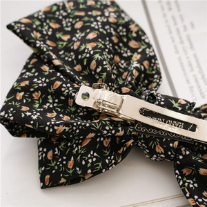 Three-layer floral bow hair clip with silver spring metal fastener and Paris handmade stamp
