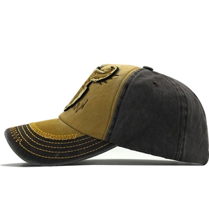 Side view of vintage patchwork baseball cap in yellow and grey with 3D embroidery detail