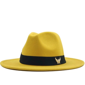 British style yellow wool fedora hat with black band and gold eagle badge accessory