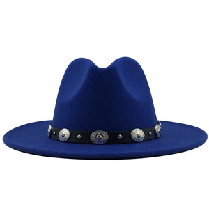 Detail of bright blue wool fedora hat featuring black leather belt and silver metal studs