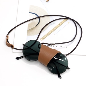 Faux leather lanyard sunglass holder with brown protective case and round black sunglasses