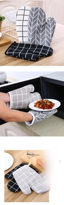 Thick heat-resistant oven mitts with hanging loops and classic lattice patterns