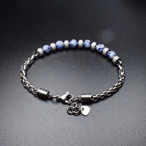 Detail of 6mm tiger eye bead bracelet with stainless steel chain and heart tag