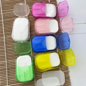 Close-up of portable paper soap sheets in various colored plastic boxes for outdoor hygiene