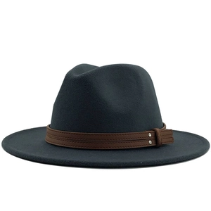 Detail of grey wool fedora hat with brown leather band and metallic rivets decoration
