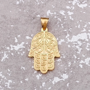 Golden Hamsa hand pendant in stainless steel with intricate floral engraving patterns