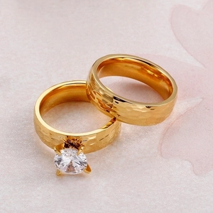Minimalist hammer texture titanium steel couple rings with 18K gold plating and gemstone