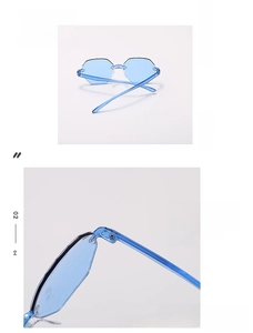 Detail view of blue rimless hexagonal sunglasses with durable hinge design and resin lenses