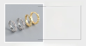 Detail showing 7.7mm diameter S925 silver hoop earrings with 1.7mm width and zircons