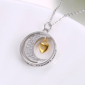 Elegant S925 silver moon and heart pendant necklace with zircon stones on white background