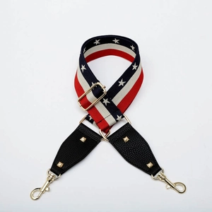 Adjustable wide shoulder strap with red white blue stars and gold metal buckles