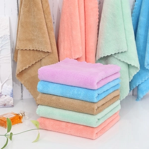 Soft microfiber coral fleece hand towels with wavy edges in various pastel colors