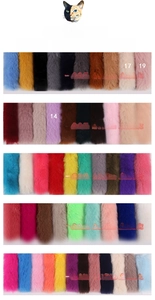 Detailed color chart of fluffy faux fur owl keychains in various vibrant plush shades