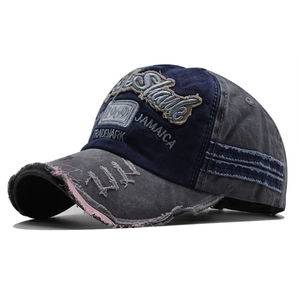 Vintage washed denim baseball cap in blue and grey with 1969 embroidery and NY brim detail