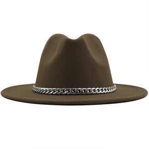 Detailed view of brown felt fedora hat featuring a chunky silver chain band decoration