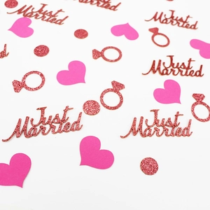 Pink and rose gold confetti set with Just Married text for wedding party decor