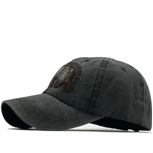 Dark grey washed cotton baseball cap featuring vintage polar bear embroidery patch