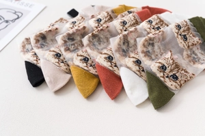 Close-up of summer ultra-thin breathable mesh socks with cute cartoon cat patterns