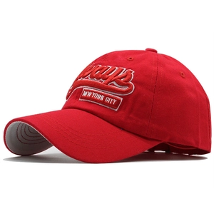 Close-up of red cotton baseball cap with white Jays embroidery and New York City patch
